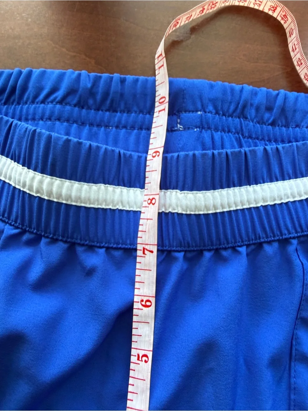 Fabletics Royal Blue Athletic Shorts with White Striped Waistband and Black Trim